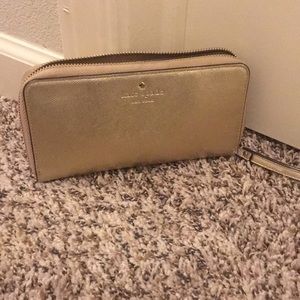 Gold Kate Spade Wristlet